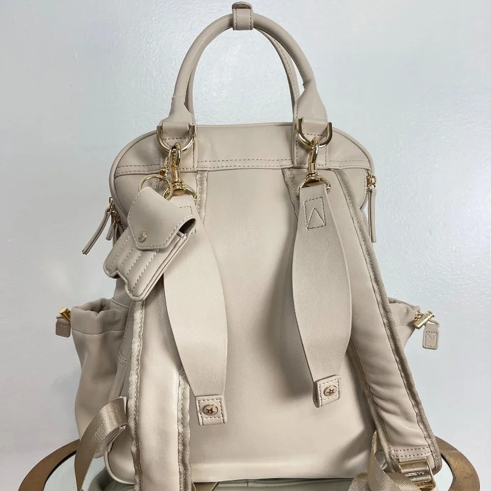 Ju-Ju-Be Cream Quilted Front Baby Backpack